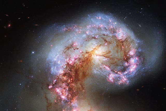 <p> Scientists from University of Southampton believe galaxies crashed together to create gigantic elliptical galaxies</p>