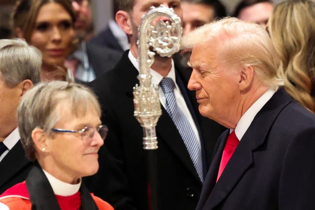 <p>Donald Trump with the Bishop of Washington, who angered the president with her sermon about mercy </p>