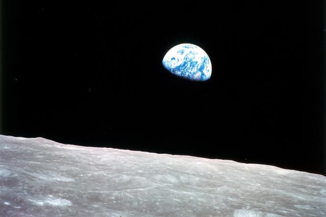 <p>The iconic ‘Earthrise’ image shows Earth appearing over the moon’s horizon on Christmas Eve 1968. Now, one theorist warns that the human civilization is at a critical junction</p>
