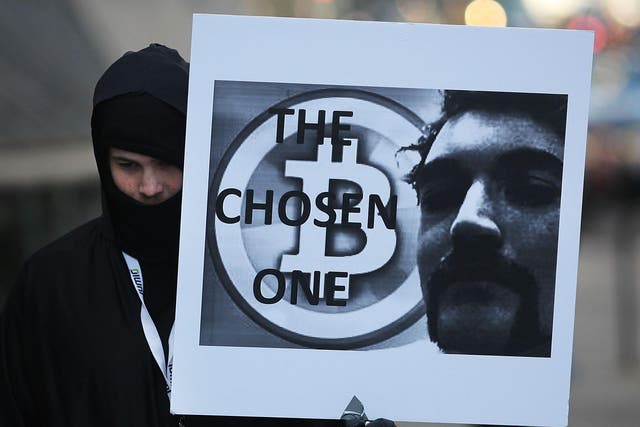 <p>A supporter of Ross Ulbricht in front of a New York court house during the Silk Road founder's trial on 13 January, 2015</p>