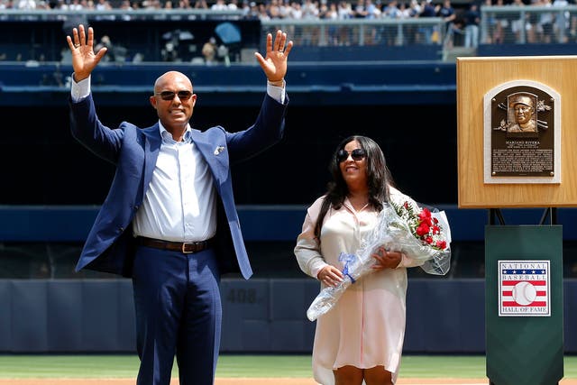 <p>Mariano Rivera pictured with his wife, Clara, at a celebration of his legacy at Yankee Stadium in 2019 </p>