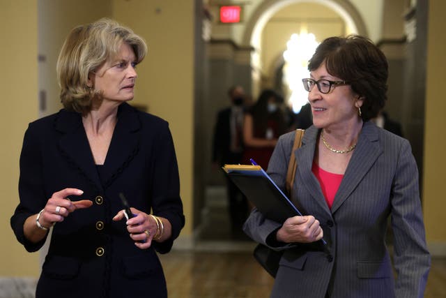 <p>Lisa Murkowski and Susan Collins are pictured walking together in 2022. The pair were the lone Republicans to vote against Pete Hegseth’s nomination in a procedural vote on Thursday. </p>