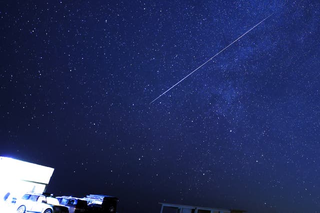 <p>A meteor burns up in the sky over the al-Abrak desert, north of Kuwait City last December. This year, the shower’s peak will occur at around the same time </p>