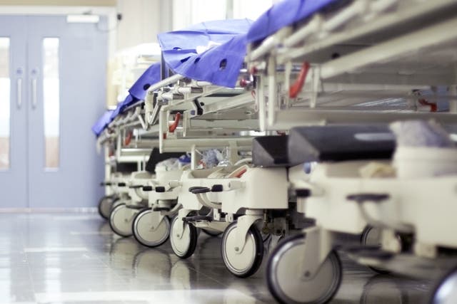 <p>Corridor care has become commonplace in besieged hospitals across the UK </p>