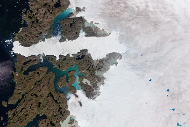 <p>An image from the European Space Agecny’s Copernicus Sentinel-2 image shows the Jakobshavn Isbræ Glacier in Greenland — one of the fastest and most active glaciers in the world. New research using the agency’s satellite and a NASA mission has shown the most extreme thinning occurred at the ice sheet’s outlet glaciers</p>