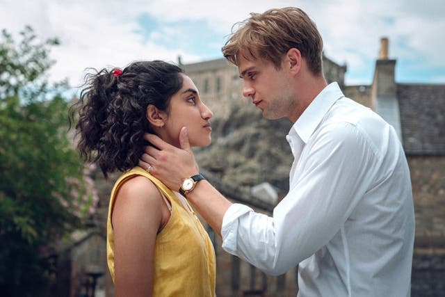 <p>This image released by Netflix shows Ambika Mod, left, and Leo Woodall in a scene from the Netflix mini-series One Day: charting the search for affection and understanding between two unlikely lovers (Netflix via AP)</p>