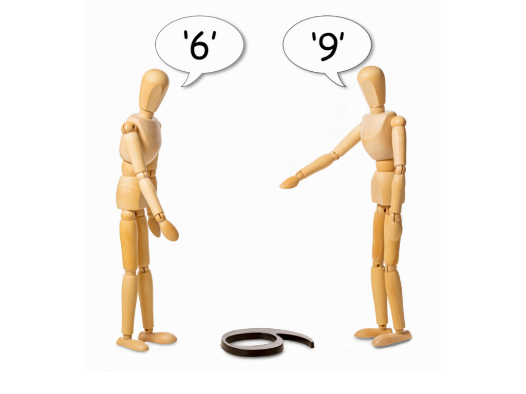 Two people pointing at the same number, one saying "6", the other saying "9"